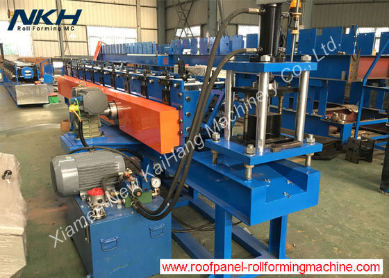 Slotted angle roll forming machine with servo motor for Z purlin clip fastening